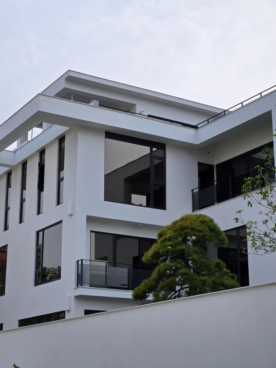 Completed modern house with large glass windows